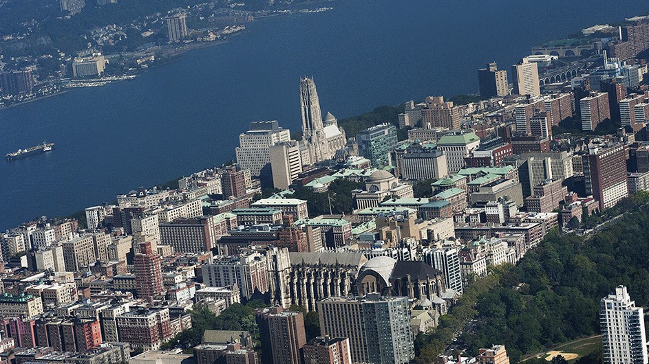 Aerial view of Columbia's Morningside campus, with a view of the Hudson River.