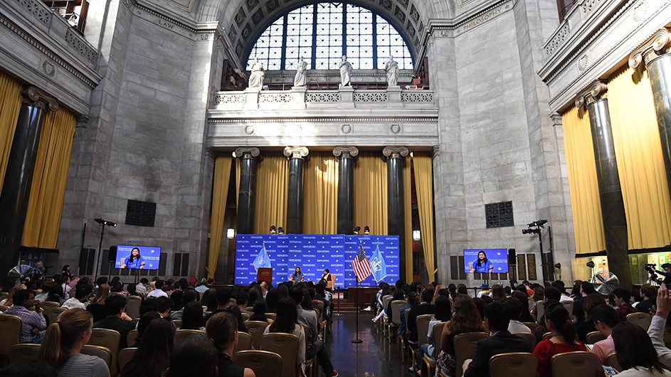A group of people attending an event in Low Library. 