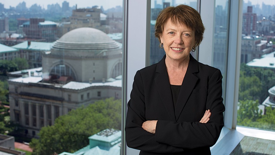 Photo: Jeffrey Schifman. Mary Boyce, a woman with short hair, in a black suit.