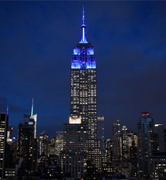 Photo of the Empire State Building glowing blue in honor of President Beilock's inauguration