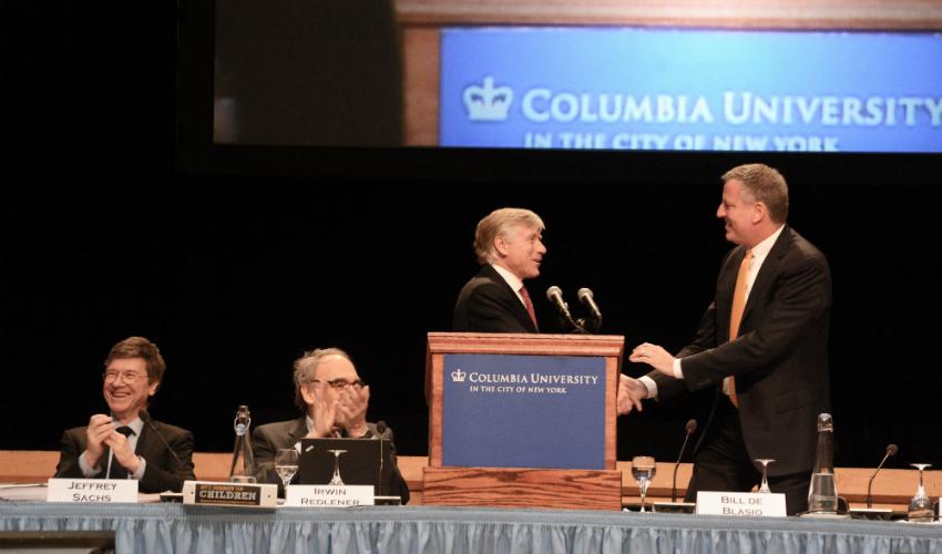 Photo of President Bollinger introducing Mayor Bill de Blasio at NYC Summit for Children.