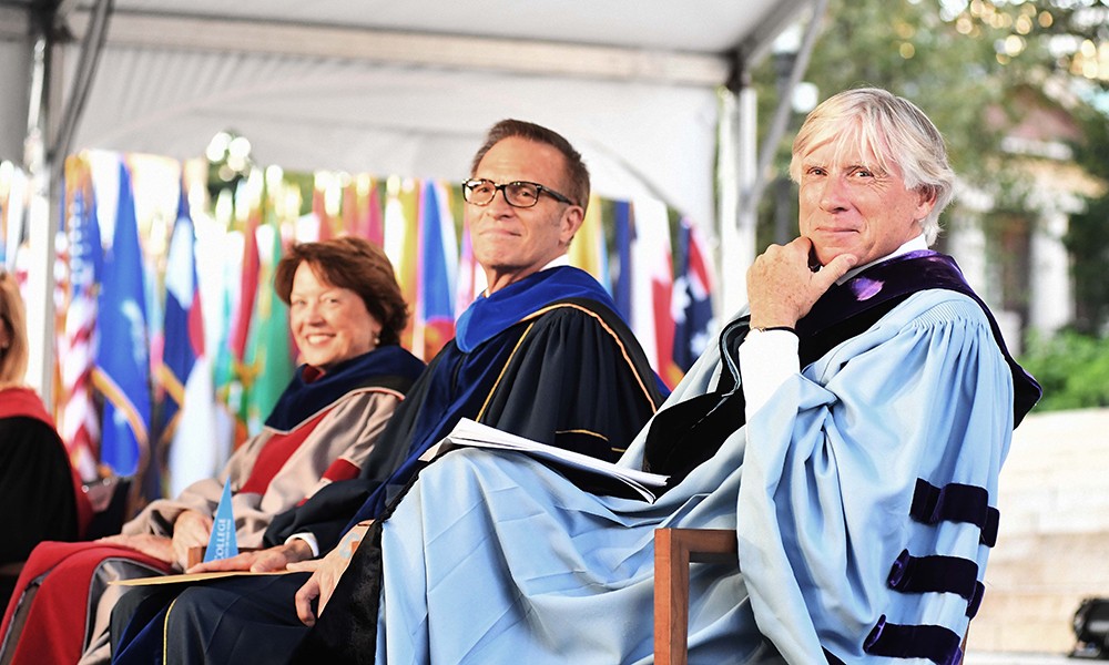 Photo of Dean Mary Boyce, Dean Jim Valentini, and President Lee Bollinger in academic regalia at Convocation