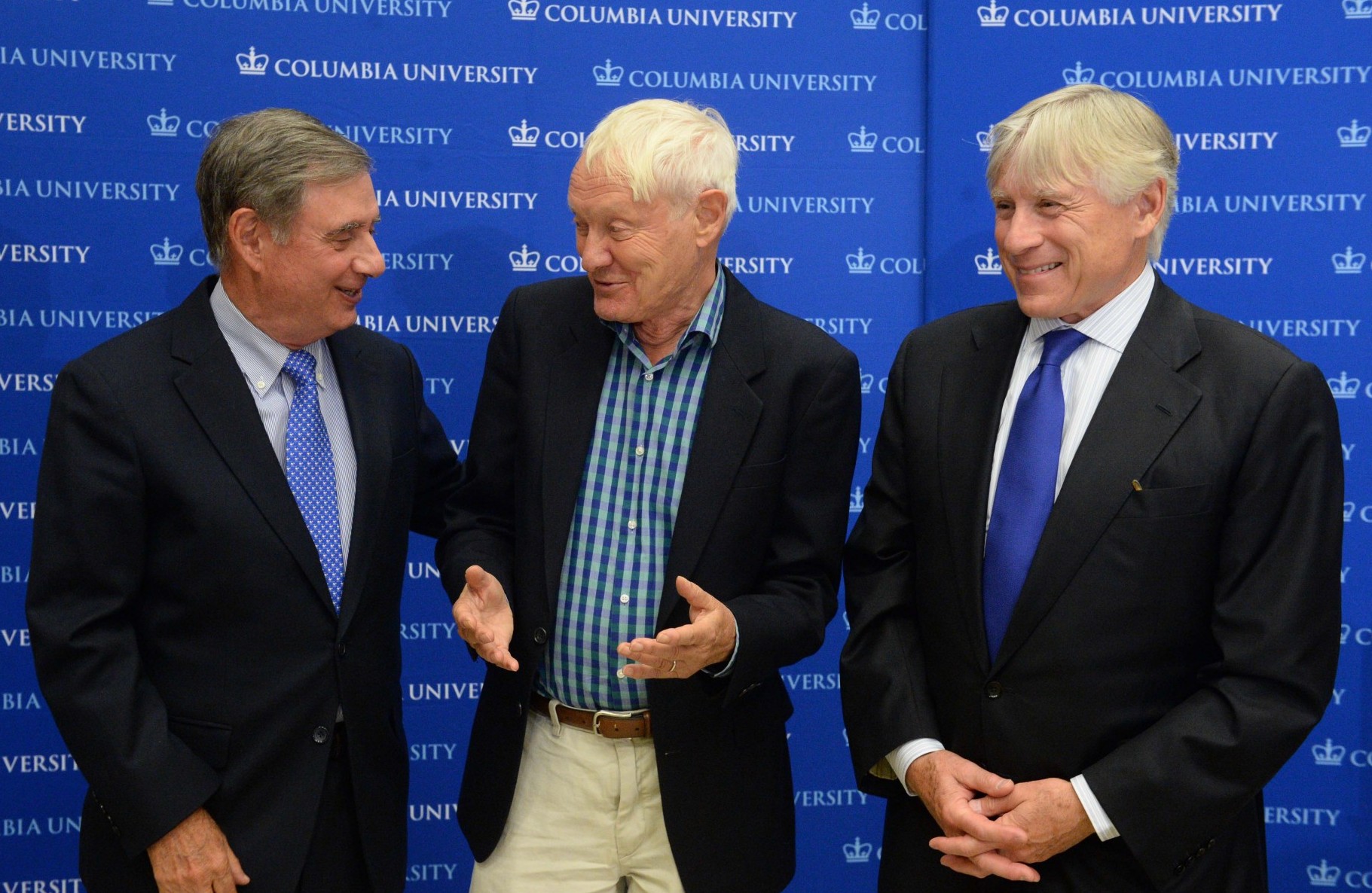 Lee Goldman, Joachim Frank and Lee Bollinger stand together after the celebration for the 2017 Nobel Prize in Chemistry is announced.