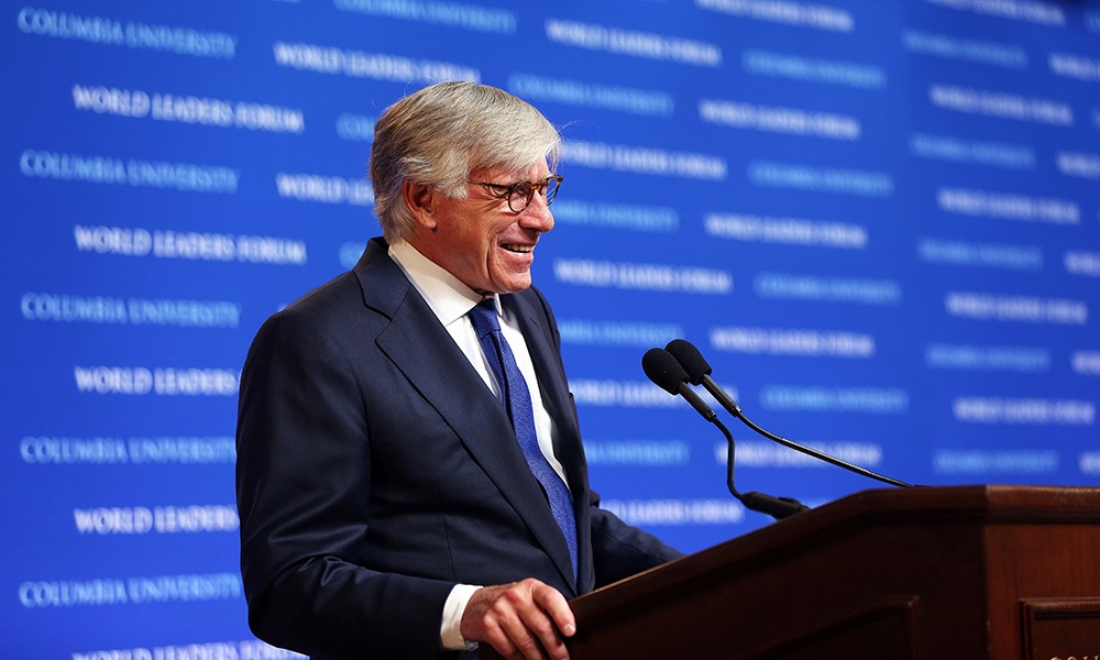 Photo of Lee Bollinger speaking at the podium at Columbia's World Leaders Forum