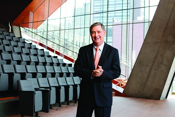 Photo of Lee Goldman, a man in a dark suit. 