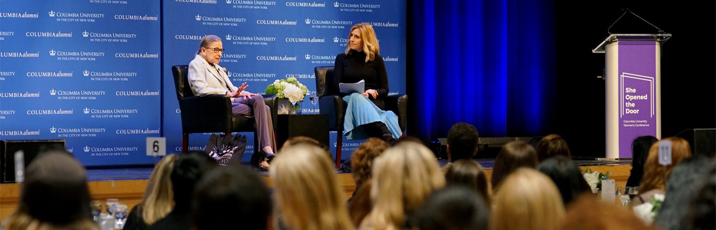 Photo of Justice Ruth Bader Ginsburg on stage with CNN's Poppy Harlow