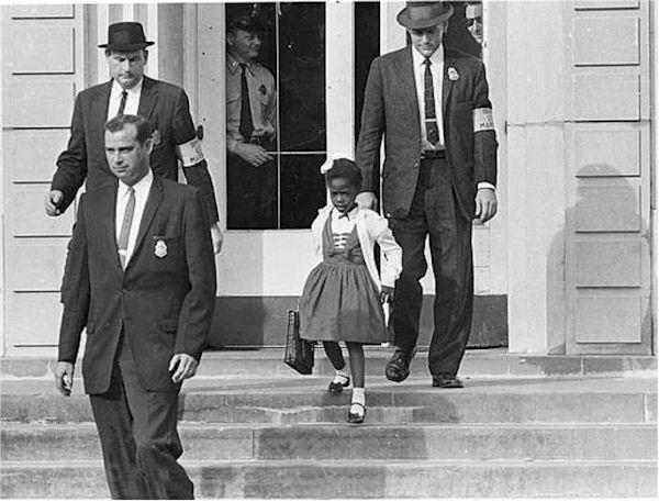 U.S. Marshals escort Ruby Bridges to school, New Orleans, 1960. Courtesy of Department of Justice. U.S. Marshals escort Ruby Bridges to School