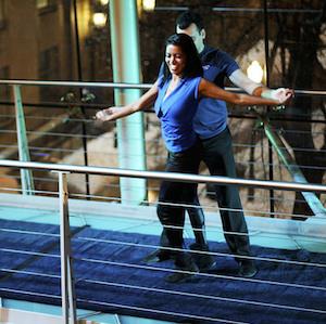 A woman and man dance during a Columbia Arts Initiative performance