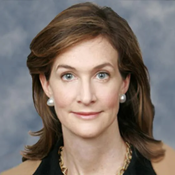 A woman in a dark top. 