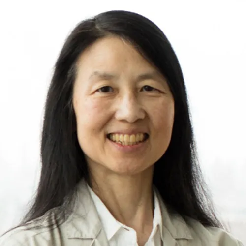 Woman in a white top. 