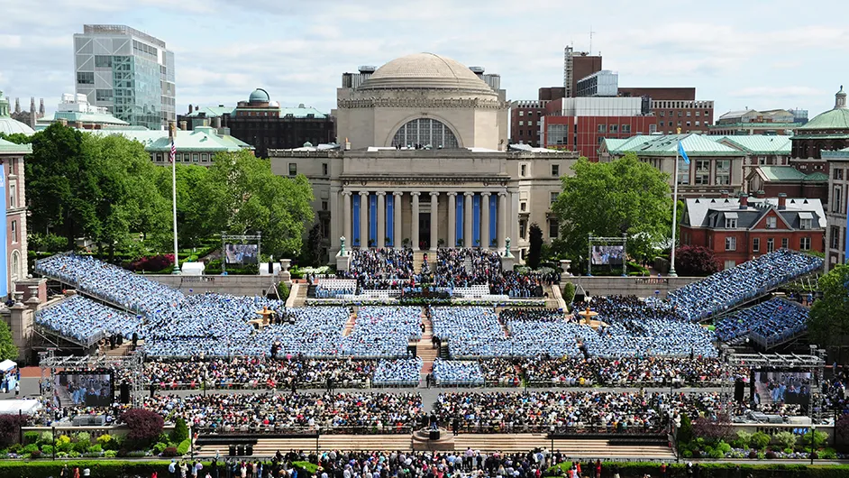University Commencement ceremonies on a sunny day in the middle of Columbia's Morningside campus