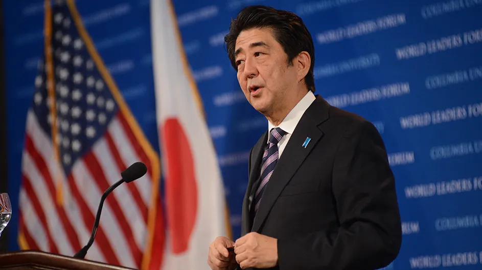 Shinzo Abe stands at a lectern at Columbia's World Leaders Forum. 