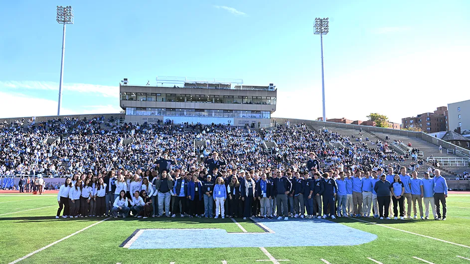 President Mnookin attends Homecoming. Photo by Eileen Barroso. 